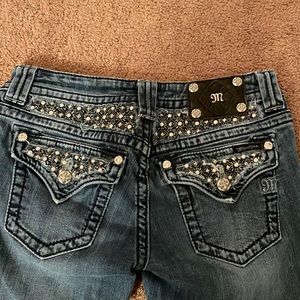 Medium wash bootcut Miss Me jeans. NWOT